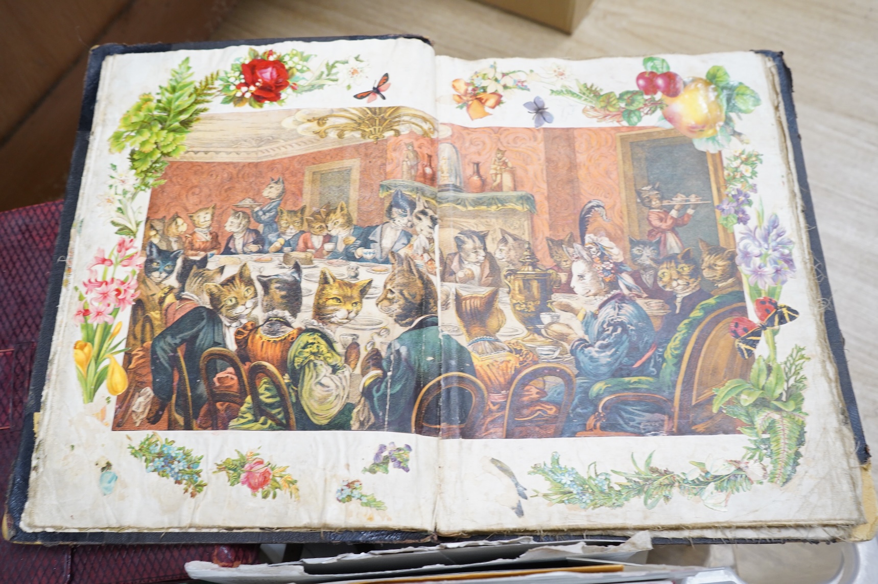 A collection of sundry items to include a scrapbook and a large collection of various stamps